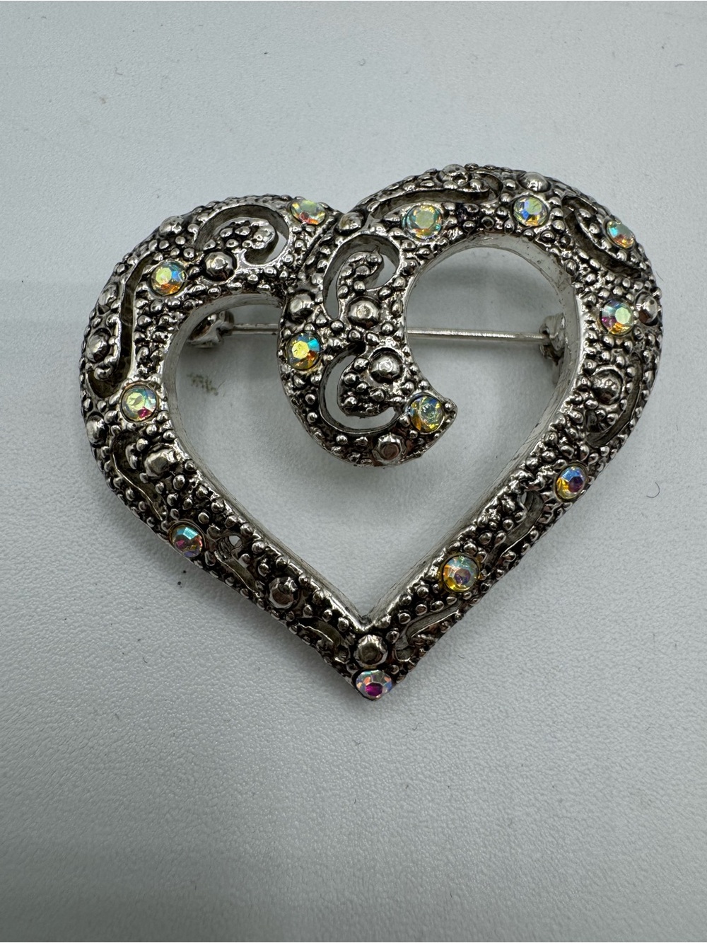 AAI Vintage 1950s Rhinestone Heart Brooch Silver Tone Swirl Design